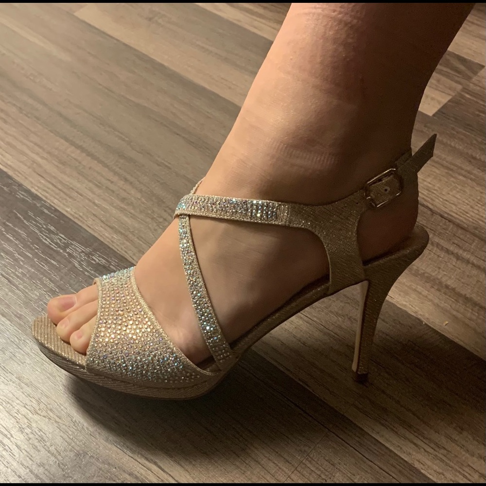 Sparkling open toed, ankle strap buckle, spikes